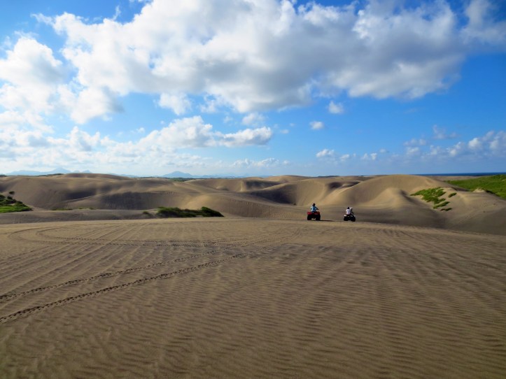 Exploring the sand dunes in Chachalacas near Veracruz, Mexico. Photo by Wake and Wander.